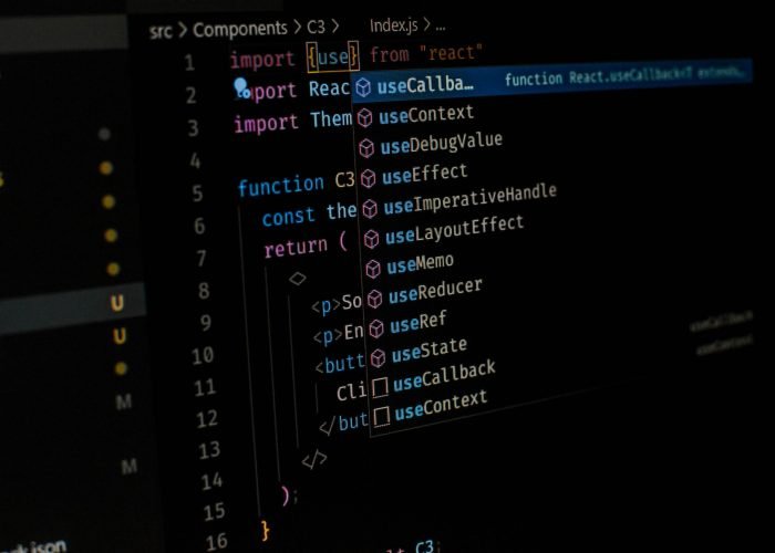Side shot of a code editor using react js and its hooks
